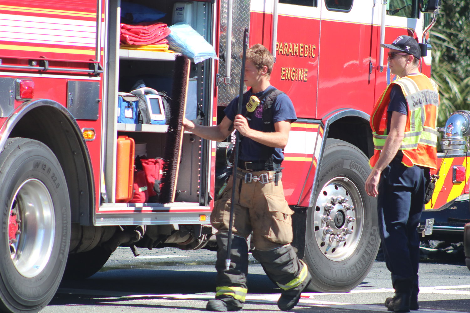 Firefighters pack up supplies following the incident.